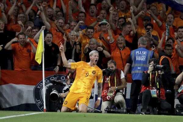 Netherlands' Wout Weghorst celebrates after scoring their sides second goal during the Euro 2024 Group C qualifying soccer match between Ireland and Netherlands at the Aviva Stadium, Dublin, Ireland, Sunday, Sept. 10, 2023. (Donall Farmer/PA via AP)