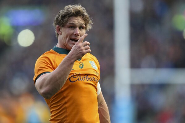 FILE- Australia's Wallaby captain Michael Hooper gestures during the rugby union international match between Scotland and Australia at the Murrayfield Stadium in Edinburgh, Scotland, Sunday, Nov. 7, 2021. Long-time Wallabies captain Michael Hooper announced Thursday Nov. 16, 2023 that he is shifting his focus to rugby sevens from the 15-a-side game with a plan to play for Australia at next year's Paris Olympics. (AP Photo/Scott Heppell,File)