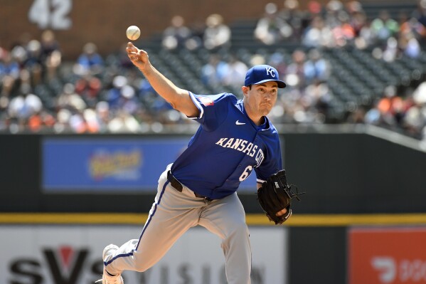 Kansas City Royals starting pitcher Seth Lugo throws against the Detroit Tigers in the first inning of a baseball game, Friday, April 26, 2024, in Detroit. (AP Photo/Jose Juarez)