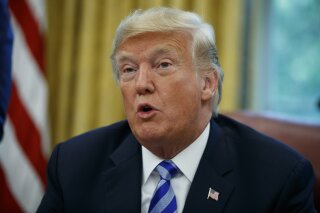 
              President Donald Trump speaks during a meeting with FIFA president Gianni Infantino and United States Soccer Federation Carlos Cordeiro in the Oval Office of the White House, Tuesday, Aug. 28, 2018, in Washington. (AP Photo/Evan Vucci)
            