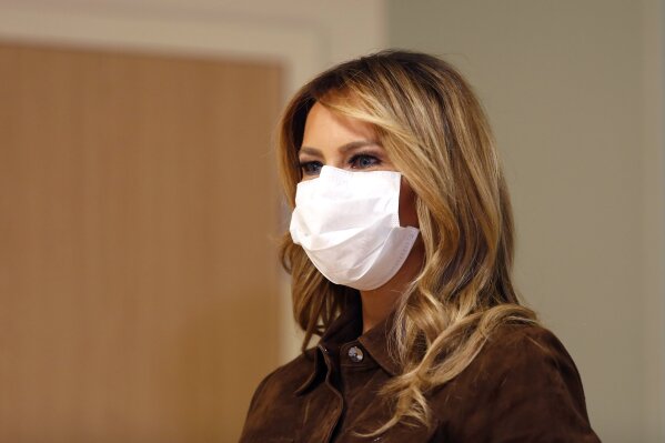 First lady Melania Trump wears a mask as she stands in a simulation lab at Concord Hospital, Thursday, Sept. 17, 2020, in Concord, N.H. (AP Photo/Mary Schwalm)