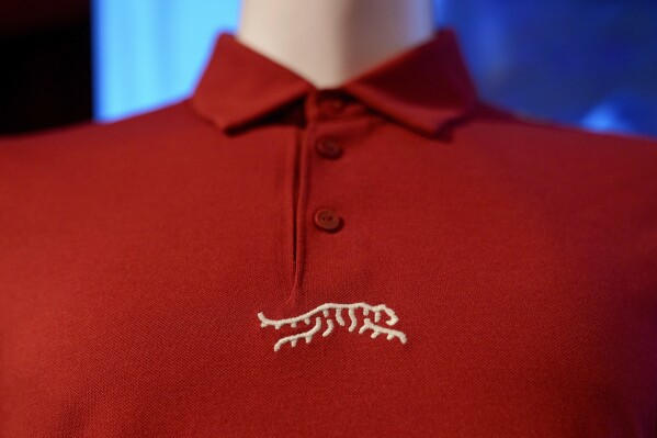 Merchandise from Tiger Woods' new clothing line, called Sun Day Red, is displayed during a news conference ahead of the Genesis Open golf tournament, Monday, Feb. 12, 2024, in the Pacific Palisades area of Los Angeles. (APPhoto/Eric Thayer)