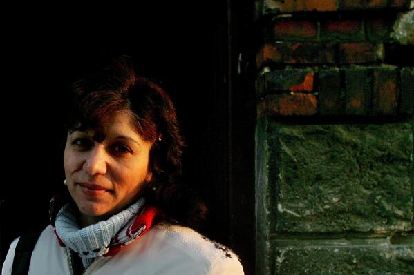 FILE - In this file photo dated Monday, Jan. 16, 2006, Elena Gorolova poses in Ostrava, Czech Republic. Dozens of roma women, including Gorolova were illegally sterilized in Sept. 1990, according to findings by the country's ombudsman.  The lower house of Czech Parliament on Friday June 4, 2021, has approved legislation to compensate Roma women sterilized against their will. (AP Photo/Petr David Josek, FILE)