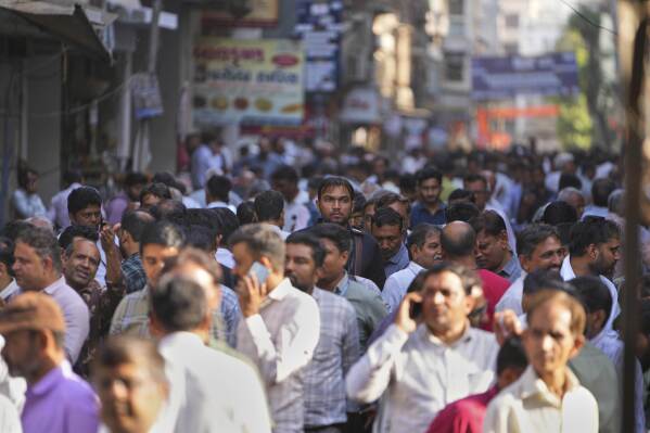 Diamond traders crowd a market street in Surat, India, on April 14, 2025. (AP Photo/Ajit Solanki)