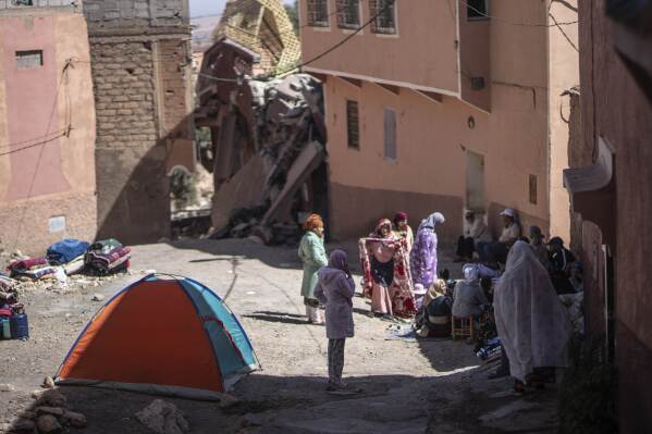 People affected by an earthquake camp outside their homes, in Moulay Brahim village, near Marrakech, Morocco, Saturday, Sept. 9, 2023. (AP Photo/Mosa'ab Elshamy)