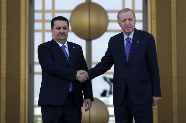 Turkish President Recep Tayyip Erdogan, right, receives Iraq's Prime Minister Mohammed Shia al-Sudani during his official visit to Turkey, in Ankara on Thursday, May 8, 2025. (Ahmad Al-Rubaye /Pool Photo via AP,)
