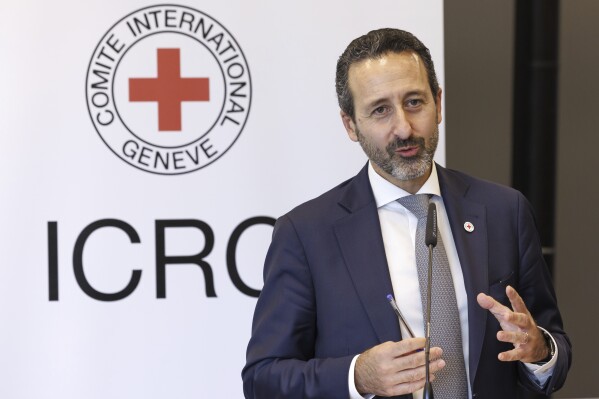 Robert Mardini, Director-General of the International Committee of the Red Cross (ICRC), talks to the media during a press conference, at ICRC headquarters in Geneva, Switzerland, Monday, Sept. 11, 2023. The international Red Cross organization that deals with conflict and prisoners of war announced plans on Monday to trim its projected budget by about one-eighth next year and cut nearly 20 percent of staff at its headquarters as funding for humanitarian aid has dried up considerably. (Salvatore Di Nolfi/Keystone via AP)