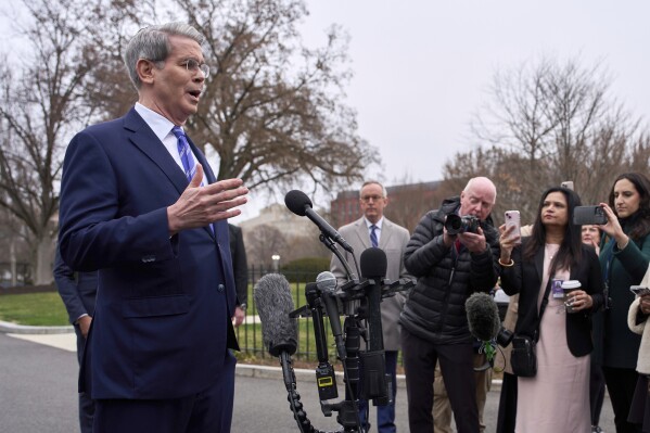 Treasury Secretary Scott Bessent speaks with reporters at the White House, March 13, 2025, in Washington. (AP Photo/Evan Vucci, File)