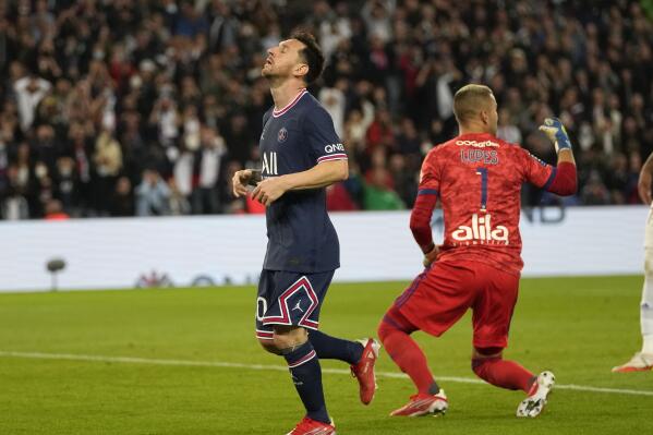 PSG's Lionel Messi reacts after missing a chance during the French League One soccer match between Paris Saint-Germain and Lyon at the Parc des Princes in Paris Sunday, Sept. 19, 2021. (AP Photo/Francois Mori)