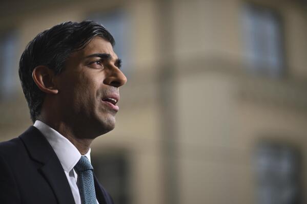 Britain's Prime Minister Rishi Sunak gives a television interview on the sidelines of the Munich Security Conference in Munich, Germany, Saturday Feb. 18, 2023. (Ben Stansall/Pool via AP)