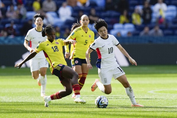 Colombia's Linda Caicedo, left, and South Korea's JI So-yun compete for the ball during the Women's World Cup Group H soccer match between Colombia and South Korea at the Sydney Football Stadium in Sydney, Australia, Tuesday, July 25, 2023. (AP Photo/Rick Rycroft)
