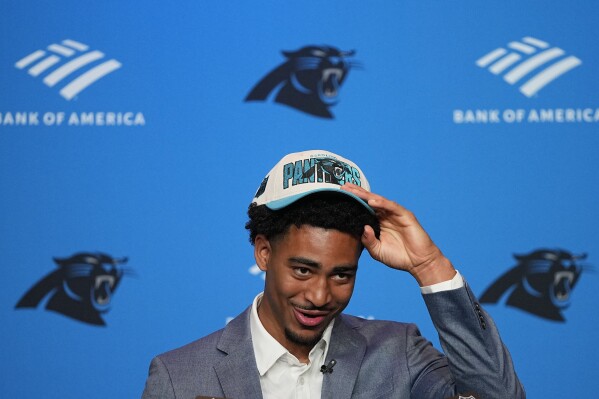 FILE - Carolina Panthers number one draft pick quarterback Bryce Young speaks during a news conference in Charlotte, N.C. Friday, April 28, 2023. The Panthers enter the draft without a first-round draft pick after trading up to get Bryce Young at No. 1 overall last year. (AP Photo/Chris Carlson, File)