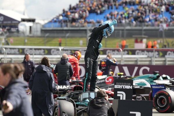 Three cheers for Brits! Russell beats Hamilton to take Silverstone F1 pole  with Norris third | AP News