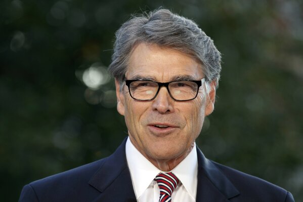 FILE - In this Oct. 23, 2019, file photo, outgoing Energy Secretary Rick Perry is interviewed at the White House in Washington. The “three amigos” used to mean just one thing in Washington -- the trio of globe-trotting senators led by John McCain who brought American idealism to the trouble spots of the world. Now, it refers to another trio, the Trump envoys pushing Ukraine to pursue investigations of Democrats and Joe Biden. (AP Photo/Jacquelyn Martin, File)