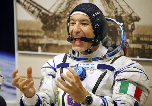 Italian astronaut Luca Parmitano, member of the main crew of the expedition to the International Space Station (ISS), gestures prior to the launch of Soyuz MS-13 space ship at the Russian leased Baikonur cosmodrome, Kazakhstan, Saturday, July 20, 2019. (AP Photo/Dmitri Lovetsky)