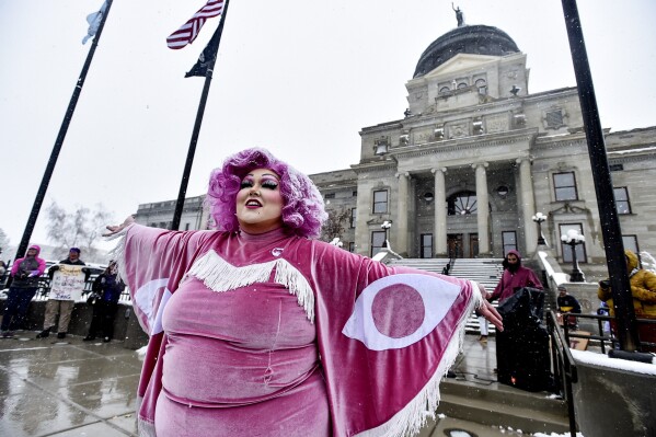 FILE - Scenes from a drag show at the Montana Capitol held in protest to a slate of bills aimed at how trans Montanans live, April 13, 2023, in Helena, Mont. A federal judge in Montana on Friday, Oct. 13, 2023 granted a preliminary injunction to block a law that sought to put restrictions on drag performances and ban drag reading events in public schools and libraries. (Thom Bridge/Independent Record via AP, File)