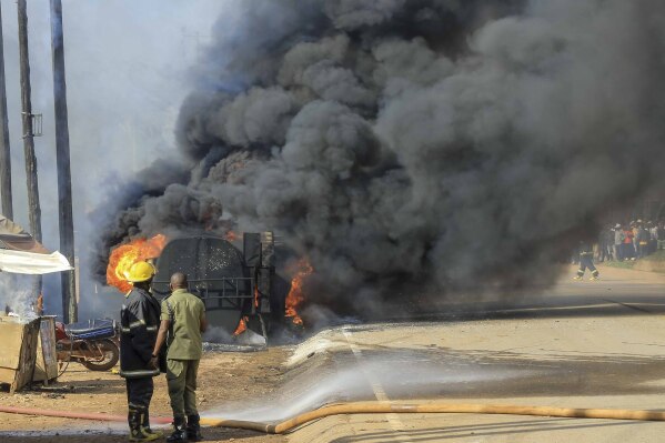 A gasoline truck overturns and explodes near Uganda's capital, killing 11 |  AP News