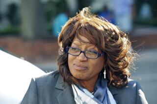 FILE - In this May 5, 2017, file photo, former U.S. Rep. Corrine Brown walks to the federal courthouse in Jacksonville, Fla. Brown, whose initial conviction in a charity and tax fraud case was tossed out by an appeals court, will plead guilty before a second trial, according to court documents filed Tuesday, May 17, 2022.  (Bob Self/The Florida Times-Union via AP)
