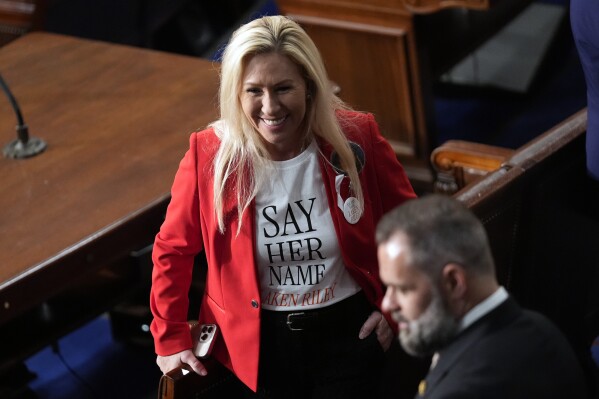 Rep. Marjorie Taylor Greene, R-Ga., wears a Laken Riley shirt as she arrives before President Joe Biden delivers the State of the Union address to a joint session of Congress at the U.S. Capitol, Thursday March 7, 2024, in Washington. (AP Photo/Andrew Harnik)