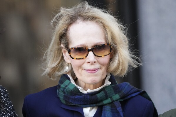 FILE - E. Jean Carroll leaves Manhattan federal court, Oct. 23, 2023, in New York. Former President Donald Trump鈥檚 lawyers asked a New York judge Friday, Feb. 23, 2024, to suspend an $83.3 million defamation verdict won won by Carroll on the grounds that it likely will not stand. (AP Photo/Frank Franklin II, File)