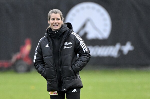 Union Berlin's co-coach Marie-Louise Eta leads a training session on Monday, Nov. 20, 2023. Marie-Louise Eta is set to become the first female coach in the Bundesliga when Union Berlin plays on Saturday. Union appointed Eta as assistant to interim coach Marco Grote following its dismissal of the popular Urs Fischer during the international break. (Matthias Koch/dpa via AP)