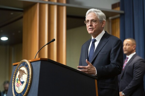 FILE - Attorney General Merrick Garland speaks at a press conference to announce arrests and disruptions of the fentanyl precursor chemical supply chain, June 23, 2023 in Washington. The Justice Department has charged dozens of people in several healthcare fraud and prescription drug schemes, including a massive scheme totaling nearly $1.9 billion and a doctor accused of ordering leg braces for patients who had their limbs amputated, officials said Wednesday. (AP Photo/Kevin Wolf, File)
