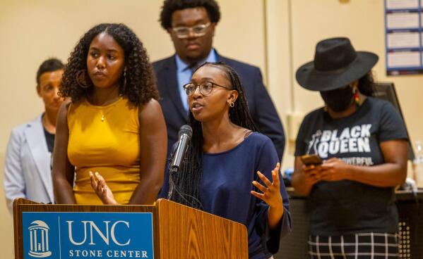 Taliajah "Teddy" Vann, president of the campus Black Student Movement, speaks during a press conference hosted by the Black Student Movement, the Carolina Black Caucus and the Black Graduate and Professional Student Association Wednesday, July 7, 2021, at UNC Chapel Hill's Sonja Haynes Center in Chapel Hill, N.C. Student leaders and activists discussed Nikole Hannah-Jones's decision to turn down UNC-Chapel Hill's offer as Knight Chair for Race and Investigative Journalism with tenure as well safety concerns for Black students and a list of demands for the future of UNC's Black Community. (Travis Long/The News & Observer via AP)