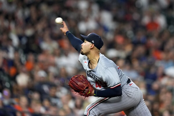 Minnesota Twins starting pitcher Pablo López throws against the Houston Astros during the seventh inning of a baseball game Friday, May 31, 2024, in Houston. (AP Photo/David J. Phillip)