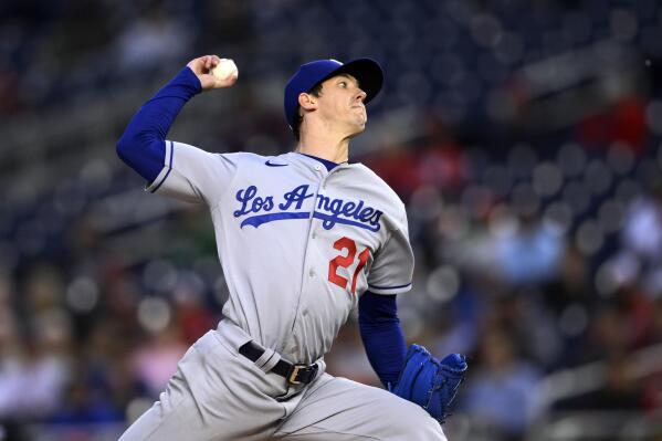 FILE - Los Angeles Dodgers starting pitcher Walker Buehler throws during the team's baseball game against the Washington Nationals on May 24, 2022, in Washington. Buehler will have season-ending surgery for the elbow injury that has prevented him from pitching for the last two months. The Dodgers announced Monday, Aug. 15, before the start of their four-game series with the Milwaukee Brewers that that Buehler's surgery is scheduled for Aug. 23. (AP Photo/Nick Wass, File)