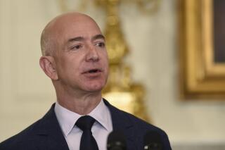 FILE - Jeff Bezos, the founder and CEO of Amazon.com, speaks in the State Dining Room of the White House in Washington, May 5, 2016.  Former president Barack Obama’s foundation announced Monday, Nov. 22, 2021 that Amazon founder Jeff Bezos has gifted the organization $100 million, which it says is the largest individual contribution it has received to date. (AP Photo/Susan Walsh, file)