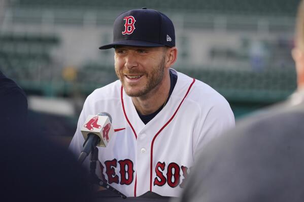 New Boston Red Sox shortstop Trevor Story smiles as he speaks to the media during a baseball press conference at JetBlue Park Wednesday, March 23, 2022, in Fort Myers, Fla. (AP Photo/Steve Helber)