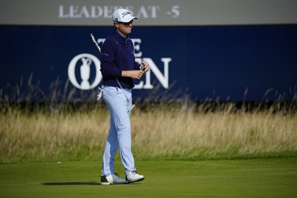 United States' Justin Thomas walks off the 9th after putting on the green on the first day of the British Open Golf Championships at the Royal Liverpool Golf Club in Hoylake, England, Thursday, July 20, 2023. (AP Photo/Jon Super)