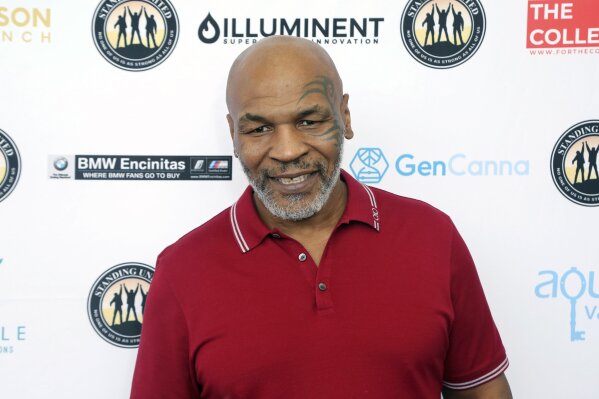 FILE - In this Aug. 2, 2019, file photo, Mike Tyson attends a celebrity golf tournament in Dana Point, Calif. Tyson hasn’t announced any plans to return to the ring, though he did suggest on an Instagram post he might make himself available for 3 or 4-round exhibitions if the price was right. (Photo by Willy Sanjuan/Invision/AP, File)