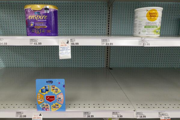 FILE - Baby formula are displayed on the mostly-empty shelves of a grocery store in Carmel, Ind. on May 10, 2022. On Wednesday, Jan. 25, 2023, Frank Yiannas, the federal Food and Drug Administration's top food safety official, resigned, citing concerns about the agency's oversight structure and the infant formula crisis that led to a nationwide shortage. (AP Photo/Michael Conroy, File)