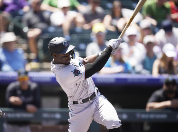 Rockies blow four-run lead before walk-off win over Marlins