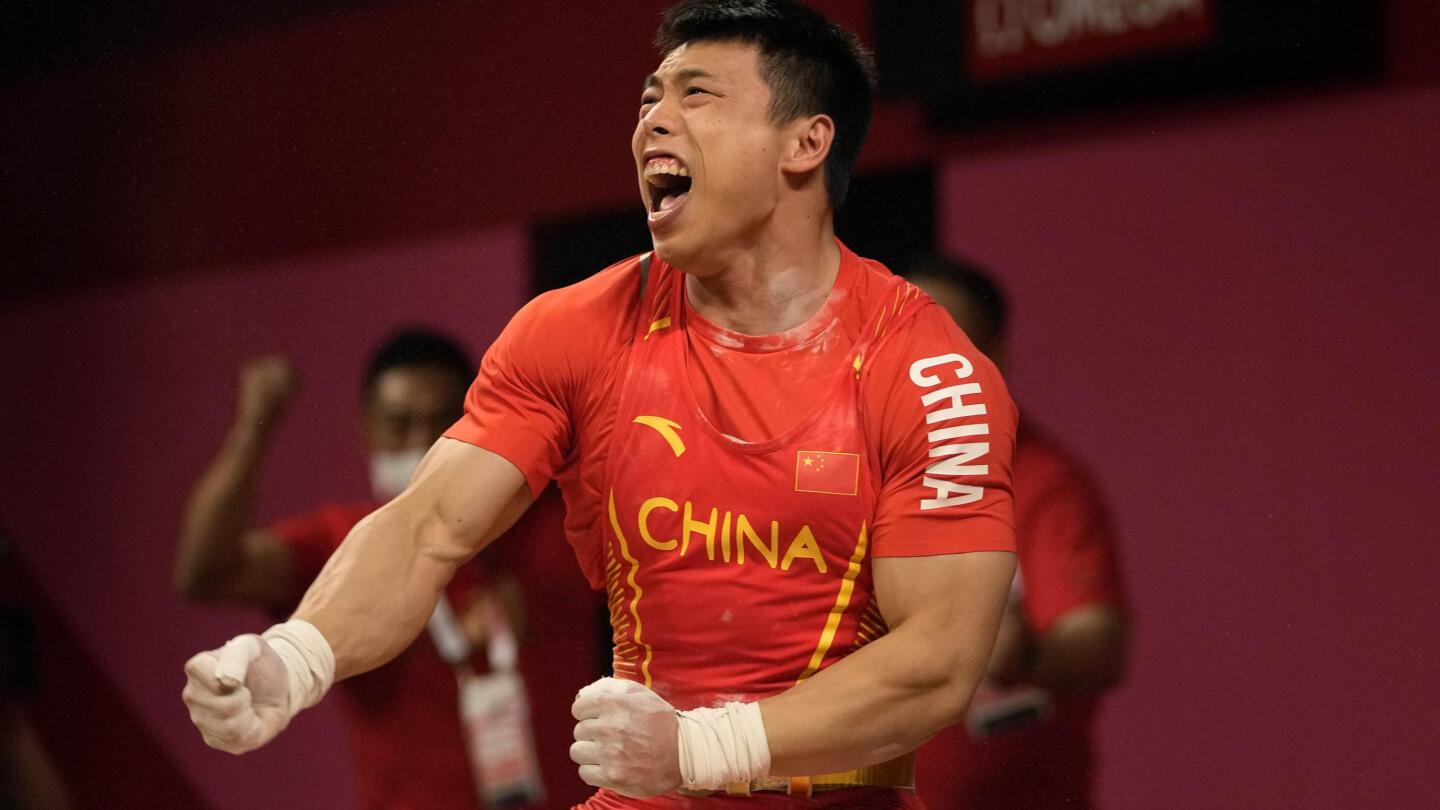 China keeps perfect record going in Olympic weightlifting