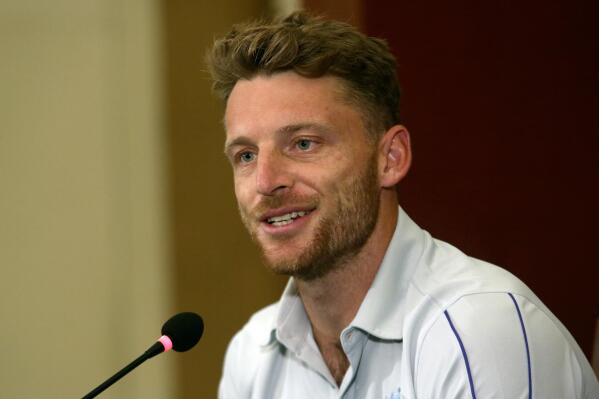 England's cricket team skipper Jos Buttler gives a press conference, in Karachi, Pakistan, Thursday, Sept, 15, 2022. Buttler hopes to raise the spirits of millions of people suffering from the devastation of floods in Pakistan by playing exciting cricket after a long gap of 17 years. (AP Photo/Fareed Khan)