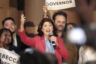 FILE - In this Sept. 9, 2021, file photo, former Wisconsin Lt. Gov. Rebecca Kleefisch announces her candidacy for governor in Butler, Wis.. Kleefisch is downplaying threats against school board members, saying recently that she would "love" for those targeted with anger during the pandemic to have experienced what she and former Gov. Scott Walker did during the Act 10 union protests a decade ago. (John Hart/Wisconsin State Journal via AP, File)