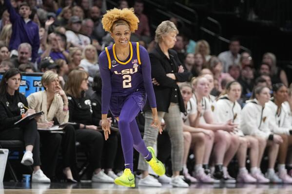 LSU's Jasmine Carson reacts to her three pointer during the first half of the NCAA Women's Final Four championship basketball game against Iowa Sunday, April 2, 2023, in Dallas. (AP Photo/Darron Cummings)