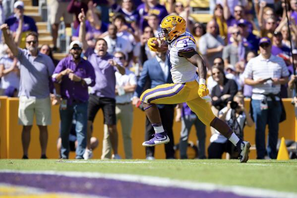 LSU's Tyrion Davis-Price scores a touchdown against Florida during an NCAA college football game, Saturday, Oct. 16, 2021, Baton Rouge, La. (Scott Clause/The Daily Advertiser via AP)