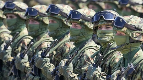 FILE - Serbian Army soldiers perform during a military exercise, at Batajnica Air Base near Belgrade, Serbia, on April 22, 2023. Serbia on Friday, June 23, 2023 reiterated the threat of an armed intervention in its former province of Kosovo, unless the NATO-led peacekeepers stationed there don't protect the minority Serbs there from 