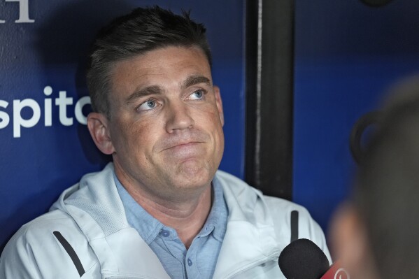 Erik Neander, Tampa Bay Rays president of baseball operations, thinks about a question as he speaks to media about recent trades before a baseball game against the Cincinnati Reds Friday, July 26, 2024, in St. Petersburg, Fla. (ĢӰԺ Photo/Christopher O'Meara)