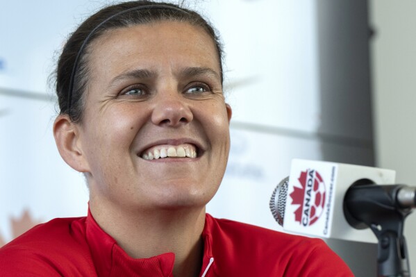 Canada's national women's soccer team captain Christine Sinclair speaks to the media for the first time since announcing her retirement, Thursday, Oct. 26, 2023, in Montreal. (Ryan Remiorz/The Canadian Press via AP)