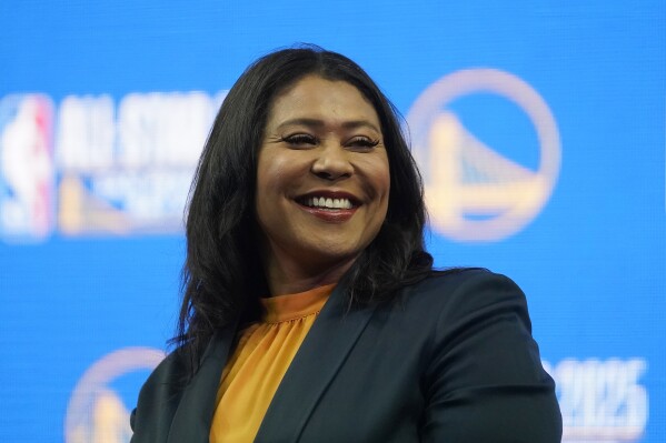 FILE- San Francisco Mayor London Breed smiles during a news conference in San Francisco at the Chase Center in San Francisco, Monday, Nov. 6, 2023. Amid a tough reelection fight, Breed has declined to veto a non-binding resolution from the San Francisco supervisors calling for an extended cease-fire in Gaza, a measure she blamed for inflaming tensions in the city. (AP Photo/Jeff Chiu, File)