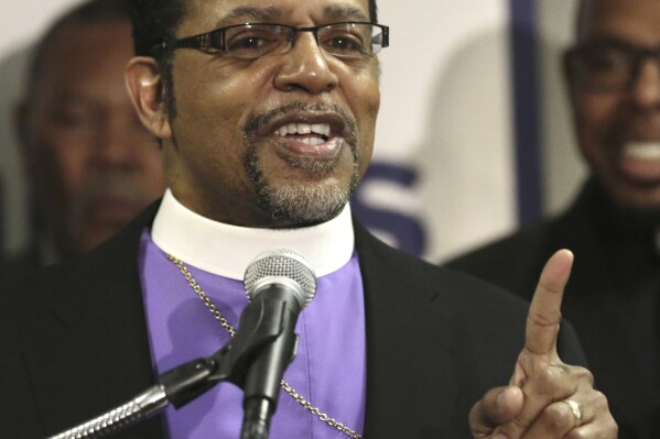 FILE - Bishop Carlton Pearson speaks at a news conference accompanied by several other clergy members, April 4, 2013, in Chicago. Bishop Carlton Pearson died Sunday, Nov. 19, 2023 in hospice care in Tulsa due to cancer according to his agent. He was 70. (AP Photo/M. Spencer Green, file)