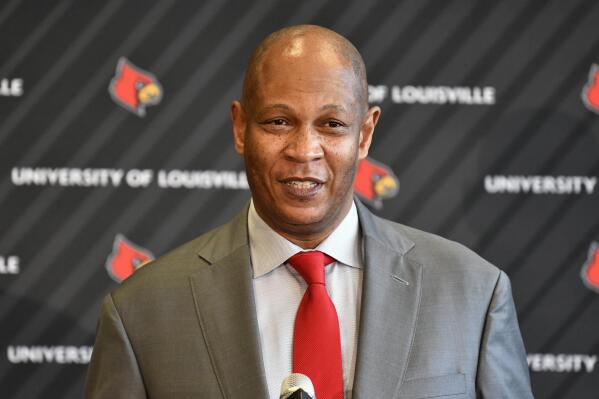 University of Louisville interim athletic director Josh Heird speaks to  reporters following a meeting of the University Board of Trustees and the  Louisville Athletic Association board, Wednesday, Jan. 26, 2022, in  Louisville