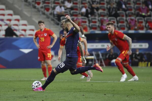 France's Karim Benzema misses a penalty shot during the international friendly soccer match between France and Wales at the Allianz Riviera stadium in Nice, France, Wednesday, June 2, 2021. (AP Photo/Daniel Cole)