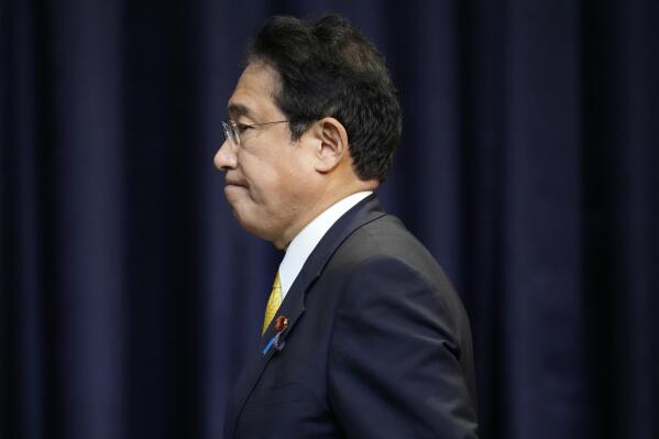 Japan's Prime Minister Fumio Kishida arrives for a press conference in Bangkok, Thailand, on the sidelines of the Asia-Pacific Economic Cooperation, APEC summit, Saturday, Nov. 19, 2022. (AP Photo/Sakchai Lalit)