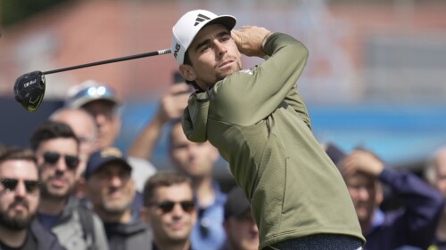 Chile's Joaquin Niemann plays his tee shot on the 12th hole during a practice round for the British Open Golf Championships at the Royal Liverpool Golf Club in Hoylake, England, Wednesday, July 19, 2023. The Open starts Thursday, July 20. (AP Photo/Kin Cheung)