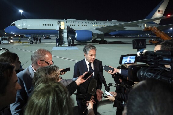 US Secretary of State Antony Blinken speaks to the media prior to departure from Al Maktoum International Airport in Dubai, United Arab Emorates, Friday, Dec. 1, 2023. The United States remains "intensely focused" on freeing hostages held in Gaza despite the resumption of the Israel-Hamas war after a week-long truce, Secretary of State Antony Blinken said Friday. (Saul Loeb/Pool Photo via AP)